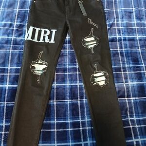 AMIRI Black Distressed Slim Jeans